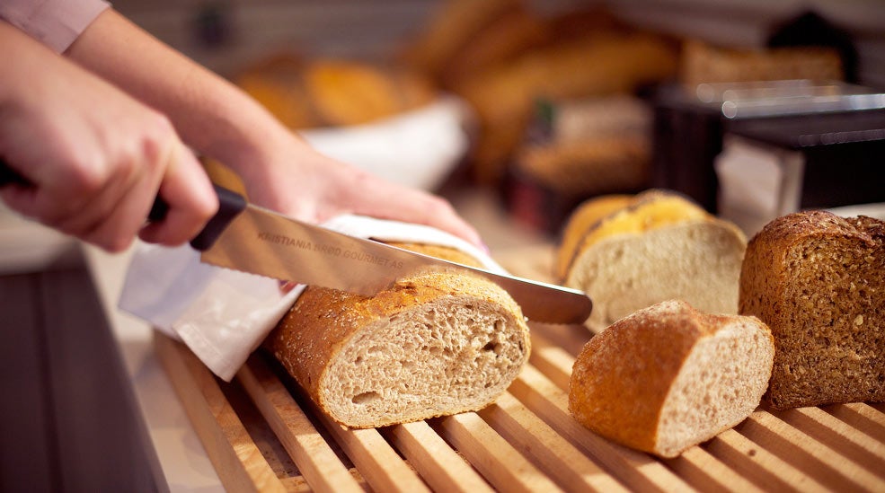 Breakfast buffet with fresh bread at Bastion Hotel in Oslo