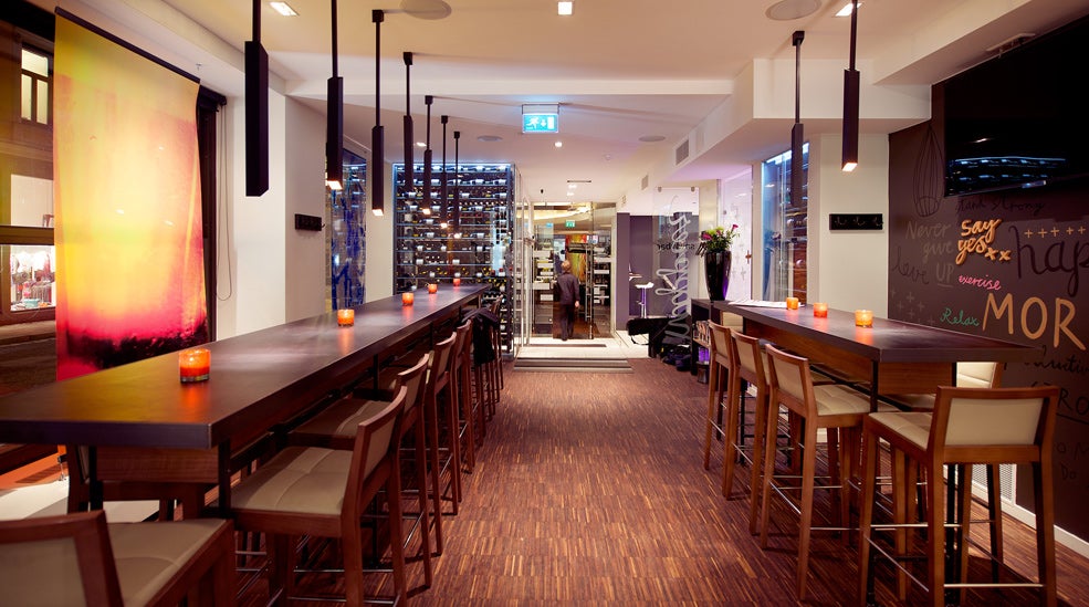 Chic and spacious lobby bar area at Savoy Hotel in Oslo