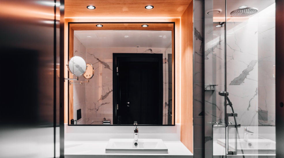 Bathroom with washbasin and shower in a Standard room at Clarion Hotel Helsinki Airport