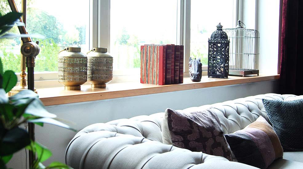 Lobby with sofa against windows at Clarion Collection Hotel Bolinder Munktell Eskilstuna