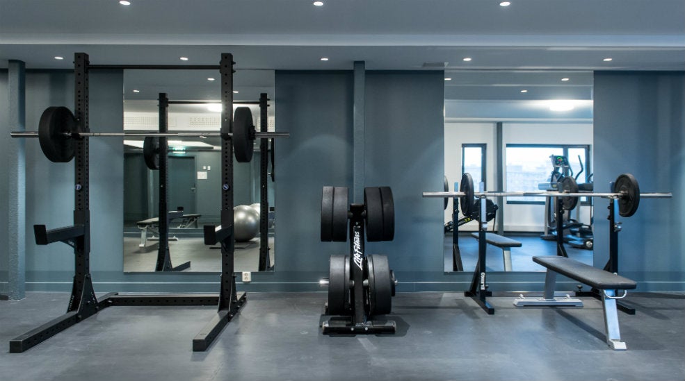 Gym with free weights at the Quality Hotel Tønsberg